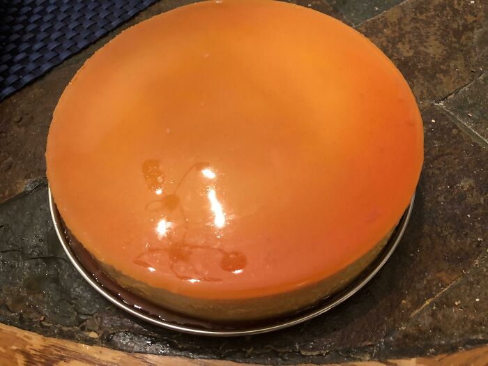 This Year’s Flan Is Perfect. You Can See Our Chandelier’s Reflection In It!