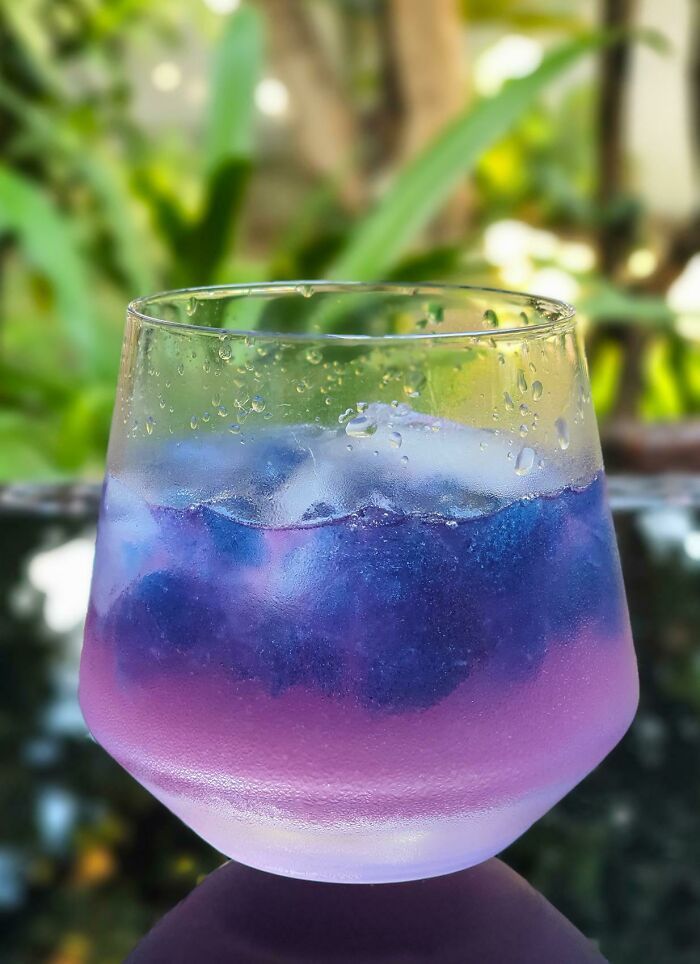Fresh Squeezed Lemonade Served Over Ice Made With Butterfly Pea Flower Tea - My Social Distancing Drink Of The Day