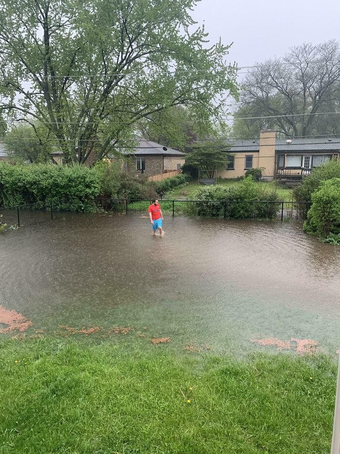 Got A Little Bit Of Rain In The Backyard. Husband For Scale. Note: We Don’t Usually Have A Lake In The Yard