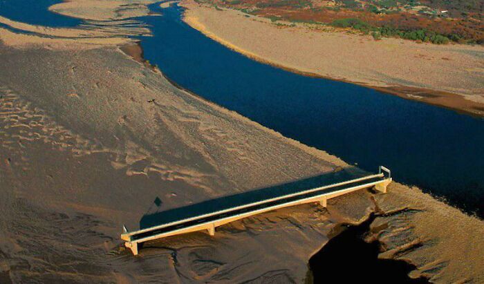 Hurricane Mitch Rendered The Choluteca Bridge (Honduras) Useless After It Changed The Course Of The River It Was Built For