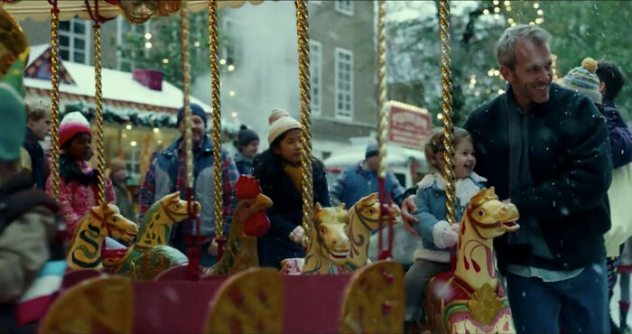 In Wonder Woman 1984 (2020), The Blond Man On The Right Is Gal Gadot's Husband, Yaron Varsano. And The Little Girl Is Maya, Their Younger Daughter