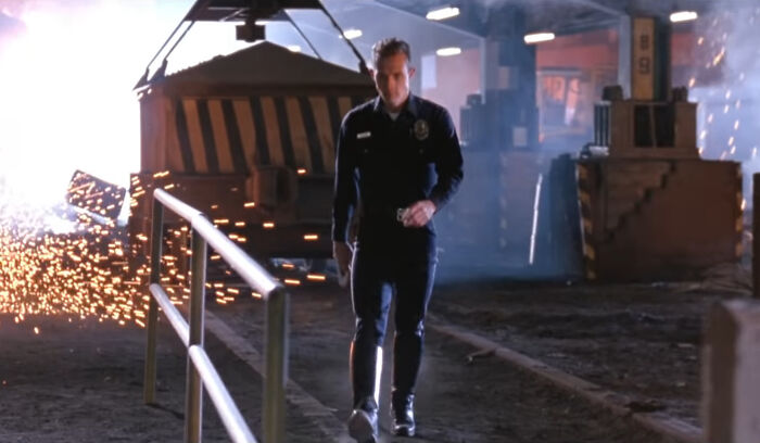 In 'Terminator 2: Judgement Day' (1991), The T-1000 Wears A Combination Of The Normal Cop And Bike Cop Clothes In The Foundry. This Is Due To It Malfunctioning / Glitching After Reassembling Himself, As It Struggles To Control It's Form