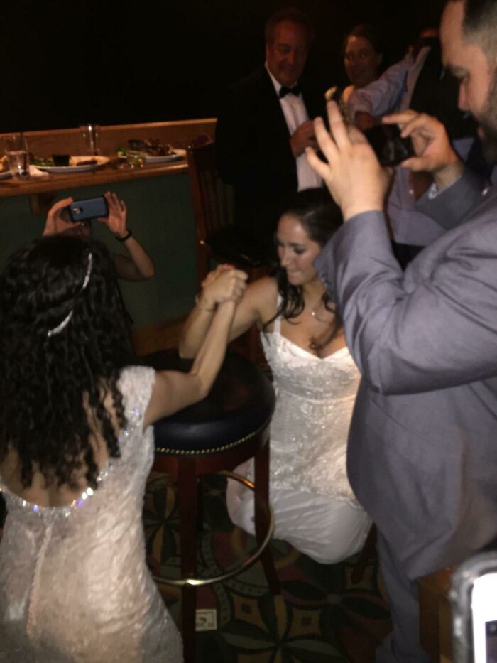 Our Hotel Threw An After Party For The 5 Weddings Last Night. My Sister Got Into An Arm Wrestling Match With Another Bride