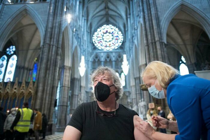 Stephen Fry Being Vaccinated At The Poets' Corner Of Westminster Abbey