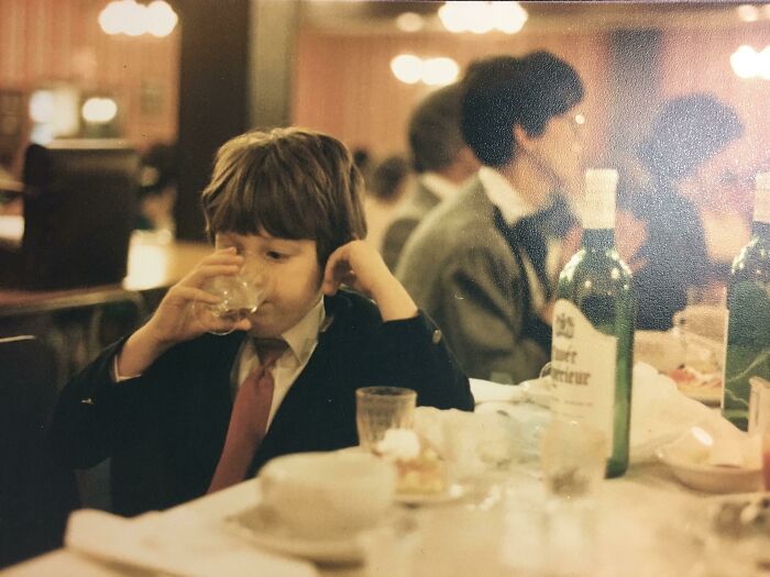 Stealing A Drink Of Wine At A Wedding While My Mom (Behind Me) Isn’t Looking
