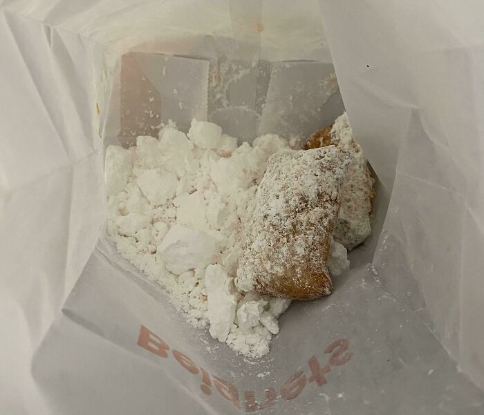 I Got A Couple Of Beignets In This Bag Of Powdered Sugar From Popeye's