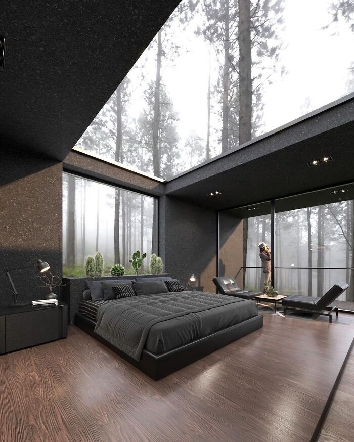 Este dormitorio con techo de cristal de una casa contemporánea
