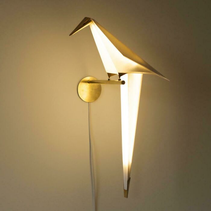 Perch Is A Unique Lamp By Multidisciplinary Designer Umut Yamac. Composed Of Folded Paper With Brass Trimmings, This Elegant Origami-Inspired Light