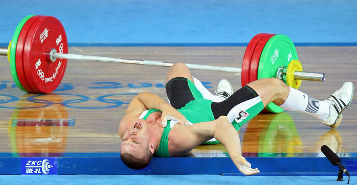 Hungarian Weightlifter Janos Baranyai's Right Arm Gave, Ripping Apart Ligaments And Muscle Under The Weight