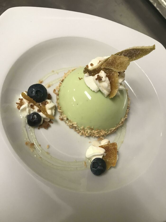 Hi! I’m The Pastry Chef At A Local Restaurant. Admittedly Plating Is My Weakness As I’ve Been More Of A Bakery Girl In The Past. Anyway This Is A Key Lime Mousse Cake, Graham Crust, White Chocolate Mirror Glaze, Toasted Coconut, Candied Citrus, And Key Lime Fluid Gel. Served With Coconut Ice Cream