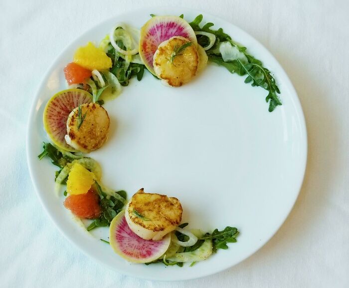 Scallops On A Bed Of Fennel And Arugula