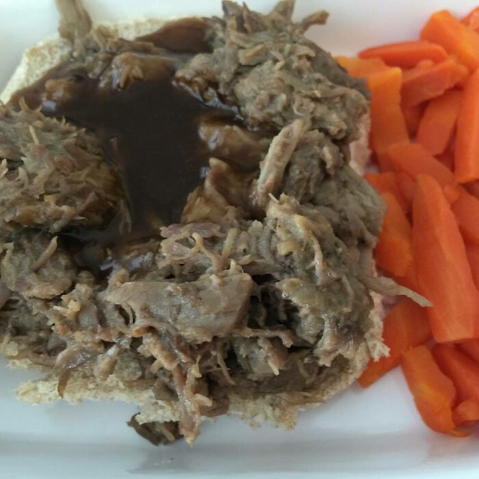 Looks Like Its Regurgitated Beef On A Bun And Carrots For Lunch Today