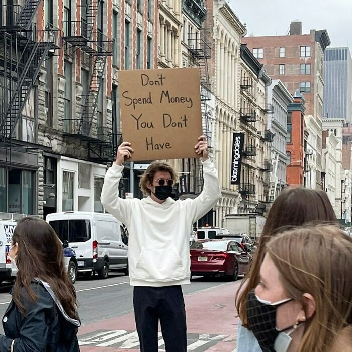 Dude-Holding-Signs-Protesting