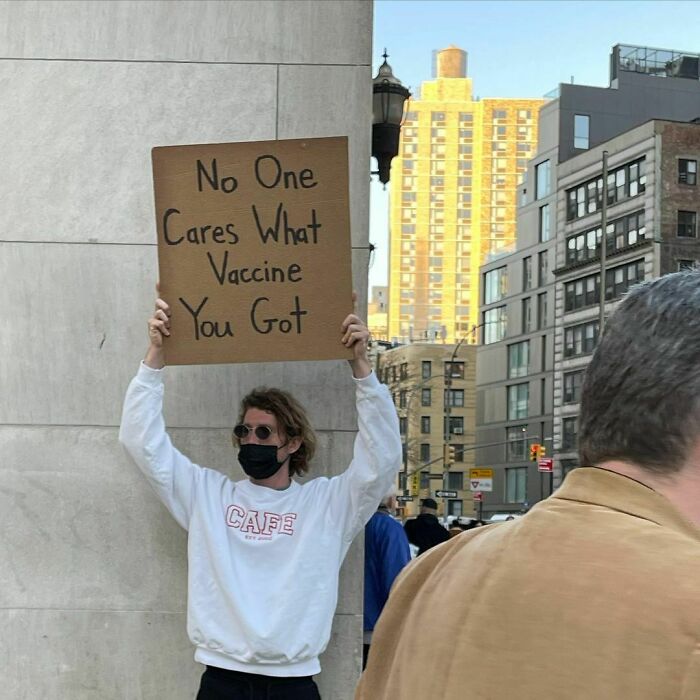 Dude-Holding-Signs-Protesting