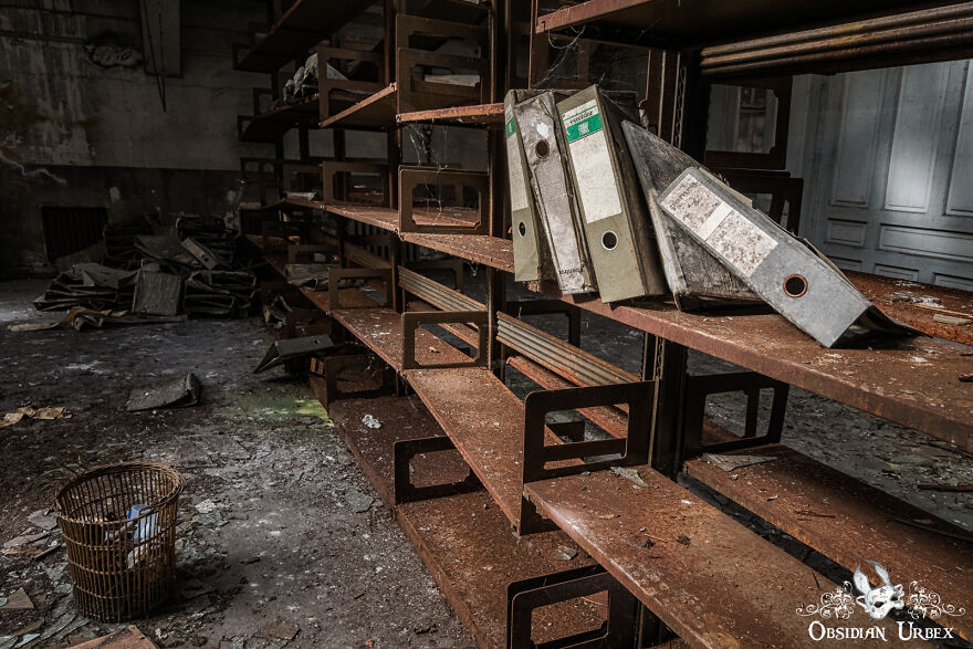 Only A Few Scraps Of The Paperwork Remain, On Shelves That Are Mainly Empty