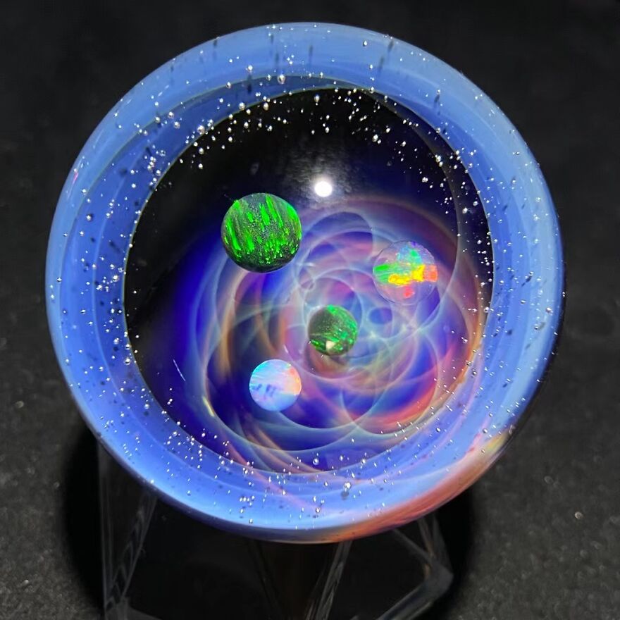 Swirling Galaxy-Inspired Glass Sphere Let You Hold The Entire Universe In Your Hand