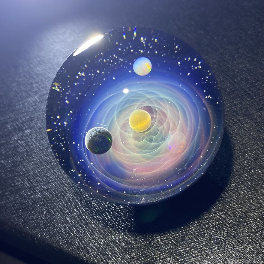 Swirling Galaxy-Inspired Glass Sphere Let You Hold The Entire Universe In Your Hand