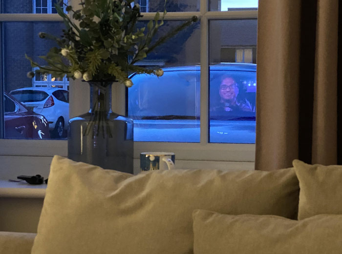 My Wife Looked Out Of Our Living Room Window And Saw This. TV Screen Reflection Lined Up Perfectly With Her Car