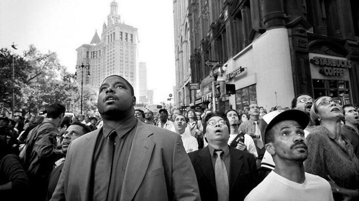Onlookers In Horror And Disbelief As They Watch The Twin Towers Collapse On 9/11