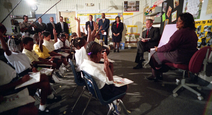 George W Bush, Reading To Students At A Tampa Elementary School, Moments Before Learning About The Second Plane Hitting The WTC On 9/11