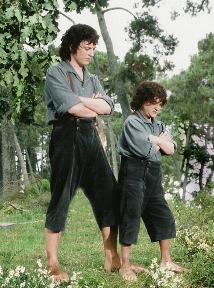 Elijah Woods With His Scale Double Kiran Shah On The Set Of The Lord Of The Rings: The Fellowship Of The Ring