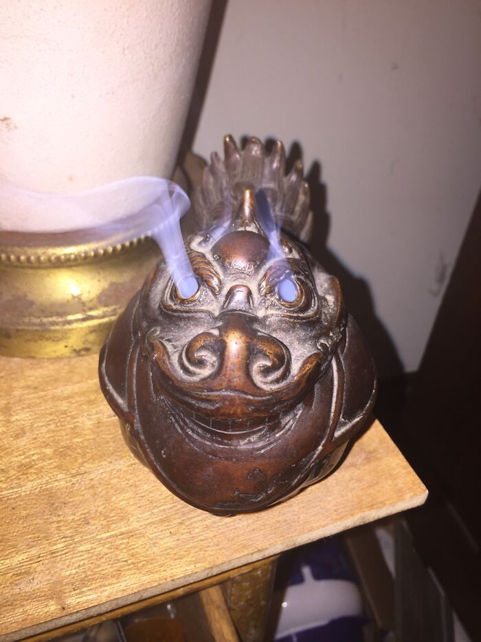 Old Incense Burner With Smoke Coming Out Of The Eyes Instead Of The Nose Or Mouth
