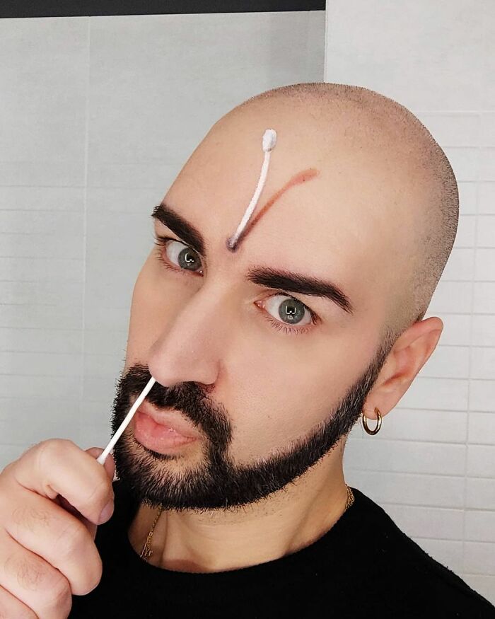 Italian artist creating convincing optical illusions using his body as a canvas with detailed face and head painting.