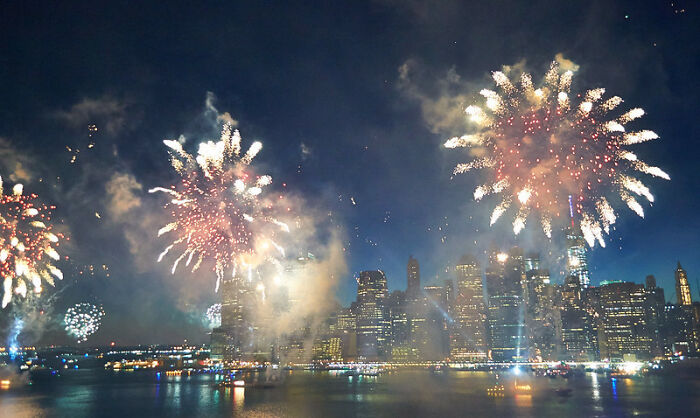 Fireworks lighting up the night sky over a cityscape, illustrating not-so-fun facts about this online group.