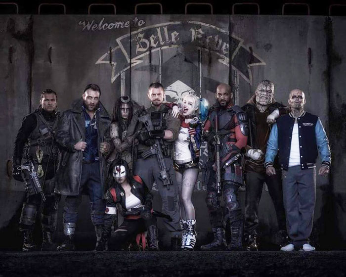 Group of people dressed as comic book characters standing together, representing people in this online group.