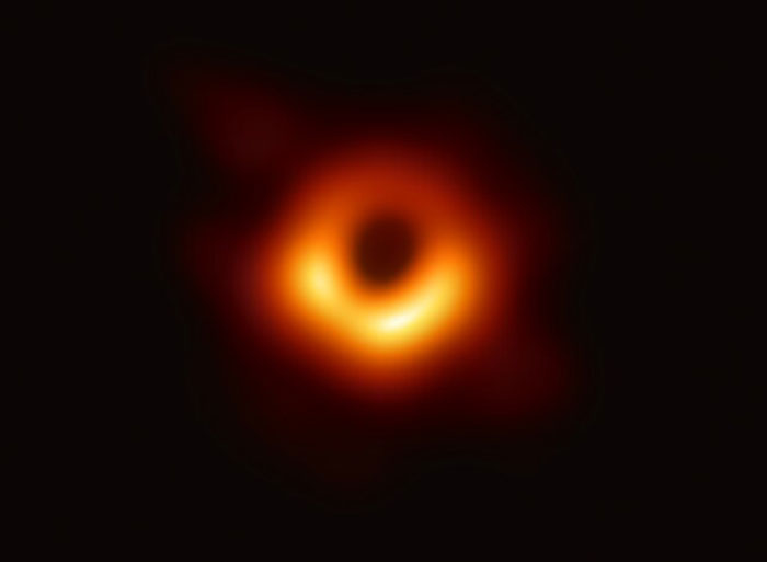 Image of a glowing ring resembling a black hole symbolizing not-so-fun facts people in this online group can't forget.