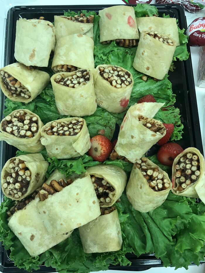 Just Found This Sub. A Few Years Ago My Job Had A Potluck And Someone Left This. Pretzel Sticks W/Nutella In Flour Tortillas On A Bed Of Lettuce And Strawberries. Nobody Ate It And We Never Found Out Who Left It.