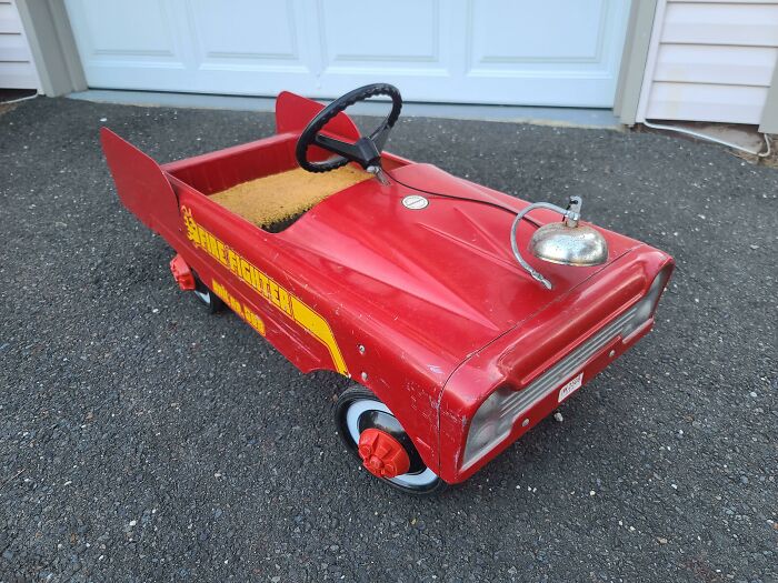 My +35 Y/O Fire Truck That My Son Now Plays With. It Still Has The Orange Shag Carpet My Father Put On The Seat To Make It More Comfortable