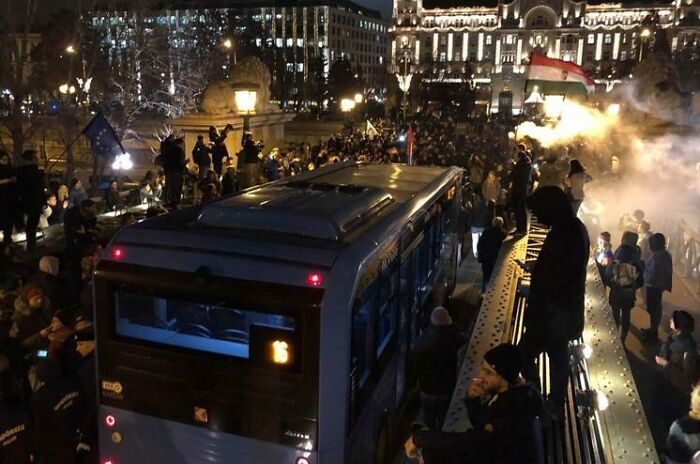 Yesterday Hungarys Ruling Party Passed The ‘Slave Law’ Which Enables Companies To Make Their Workers Work Extra 400 Hours. The Overtime Ony Has To Be Paid After Three Years. Protesters Confronted The Authorities In The Whole City, The Police Used Gas And Pepper Spray Several Times