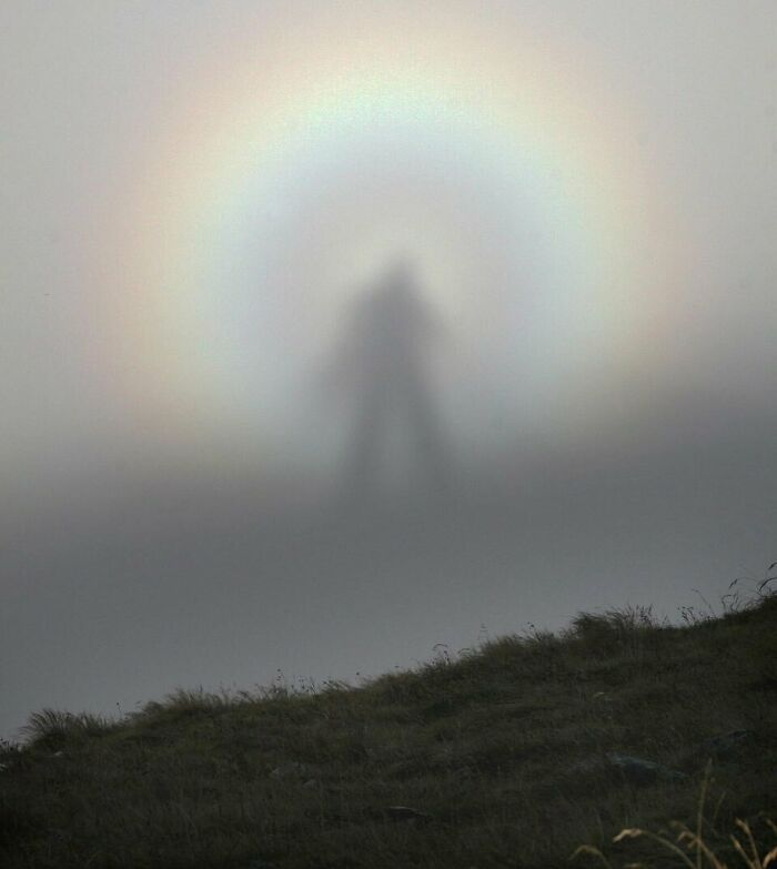 A Rare Optic Sight, The "Brocken Spectre," Occurs When A Person Stands At A Higher Altitude In The Mountains And Sees His Shadow Cast On A Cloud At A Lower Altitude