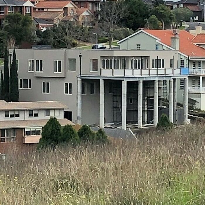 The Correct Amount Of Massively Over-Scaled Balcony Addition