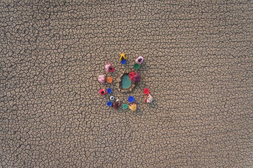 Collecting Water From Driedout Riverbeds By Sujon Adhikary (Highly Commended In People Category)