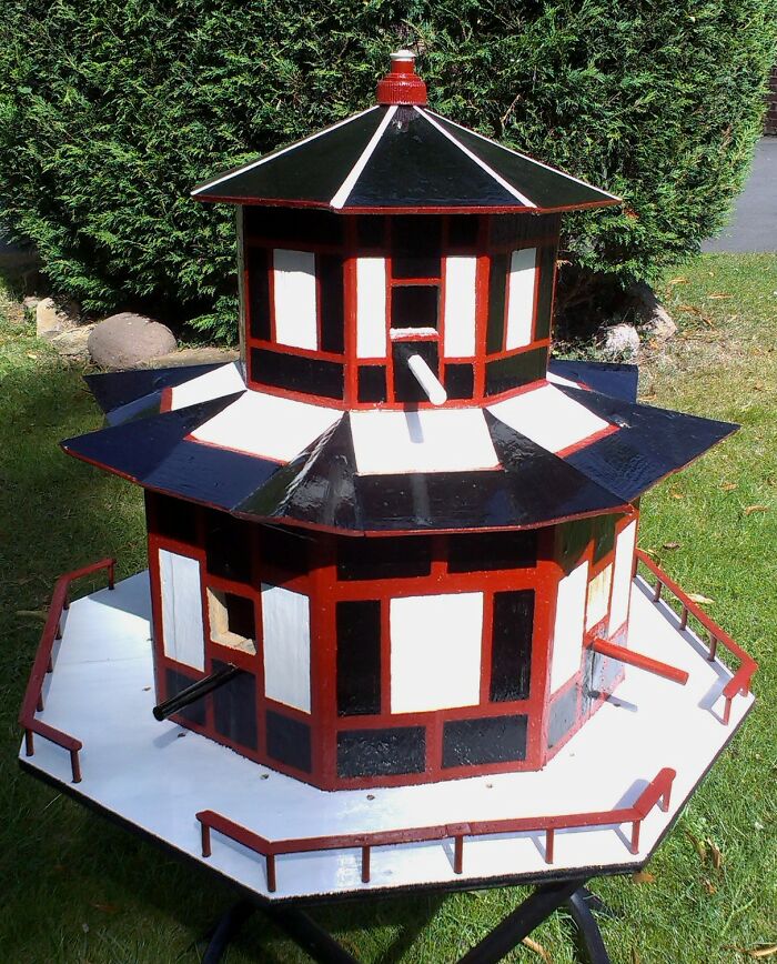 A Birdhouse In The Style Of A Pagoda.