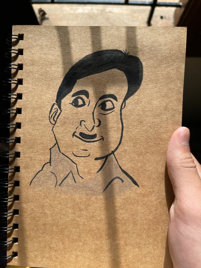 Artist Captures Face In His Sketchbook Artist Captures Face In His Sketchbook