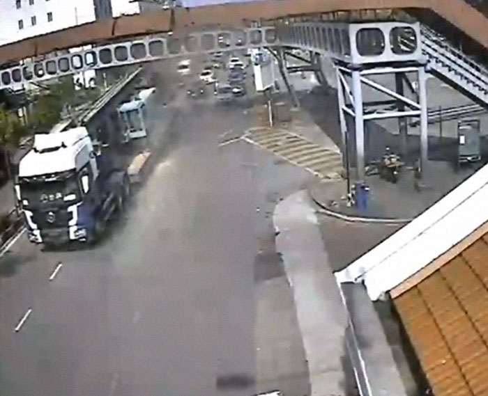 050220 Trailer Driver Misjudged It's Height, Crashed In To A 45 Years Old Iconic Pedestrian Bridge In Penang, Malaysia. The Bridge Is Beyond Repair And Got Torn Down The Next Day. Local Government Suing The Transport Company