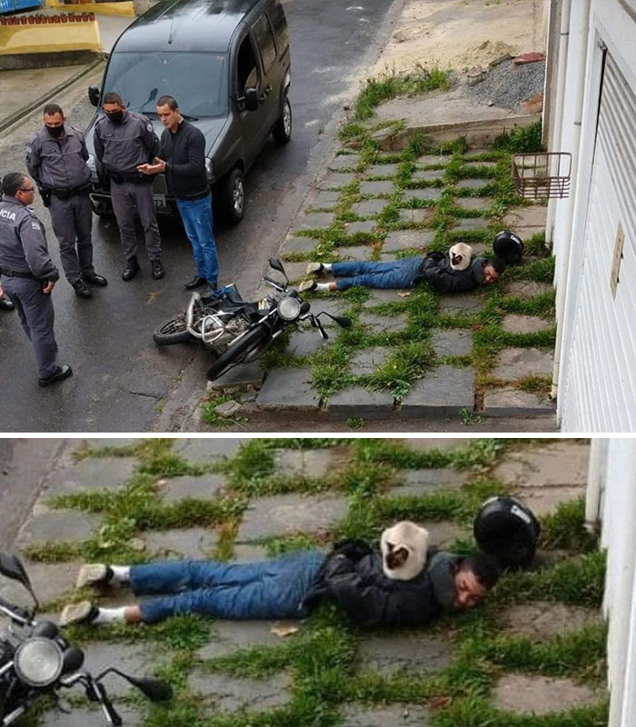 Man lying on grass and stone path beside fallen motorcycle and police, showing a weird Instagram account moment.