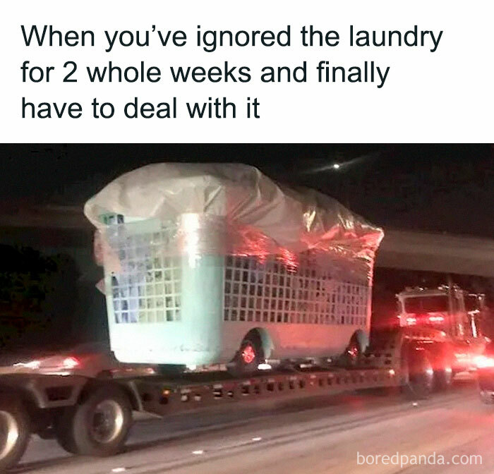 Giant laundry basket on a truck, symbolizing funny adult memes about procrastinating household chores.