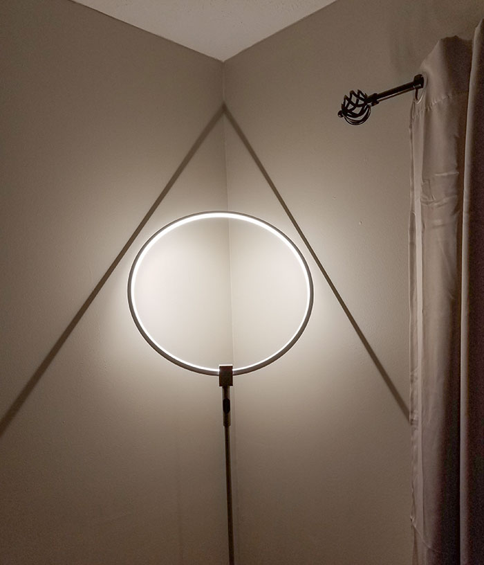 My Round Lamp Throws A Triangle Shadow
