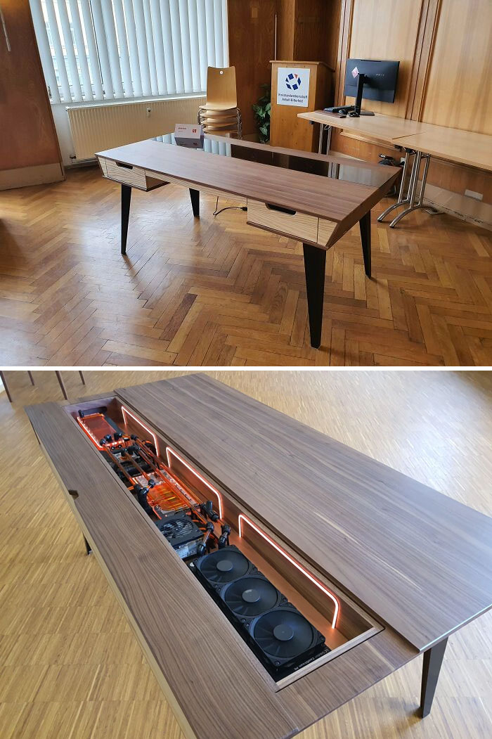 Sleek woodworking desk with hidden custom PC build, showcasing advanced woodworking craftsmanship from an online woodworking group.