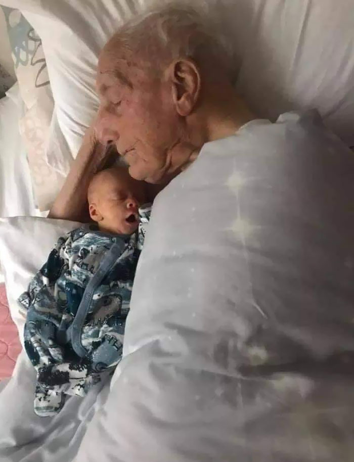 A 5-Week-Old Sleeping Next To His 101-Year-Old Great-Grandfather