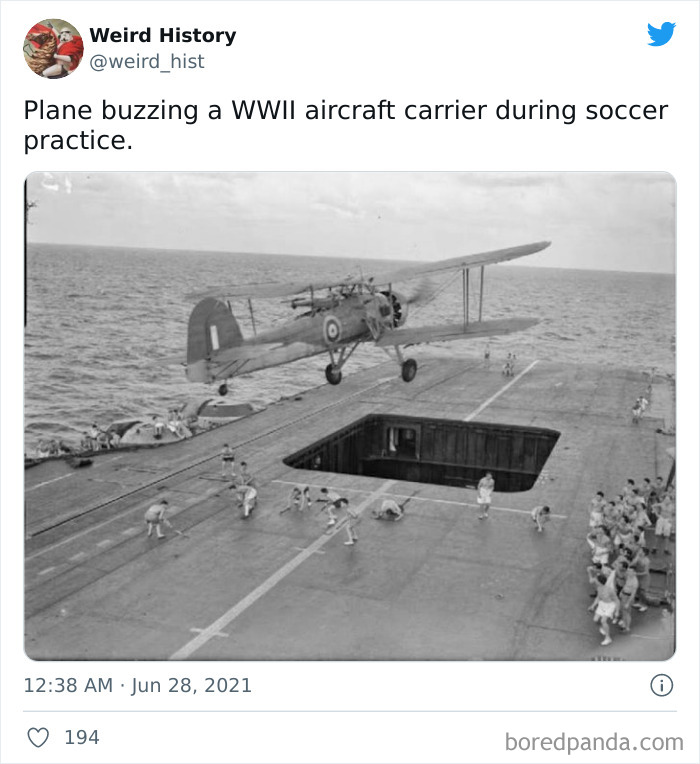 WWII plane buzzing an aircraft carrier while soldiers practice soccer on deck, showcasing weird history and trivia fact.