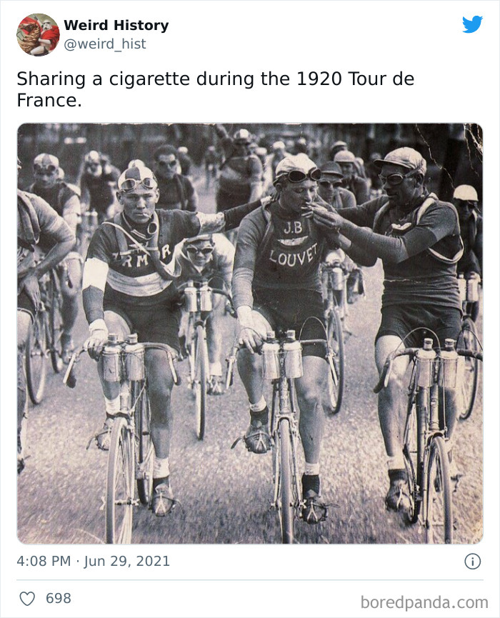 Cyclists sharing a cigarette during the 1920 Tour de France, illustrating a weird history fact for trivia lovers.