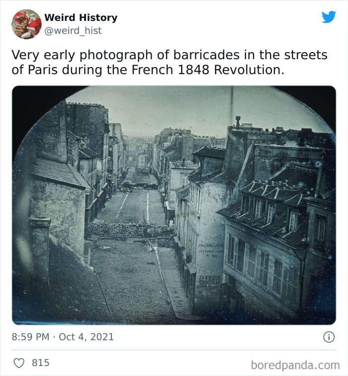 Early black-and-white photo of barricades in Paris streets during the French 1848 Revolution, weird history fact.