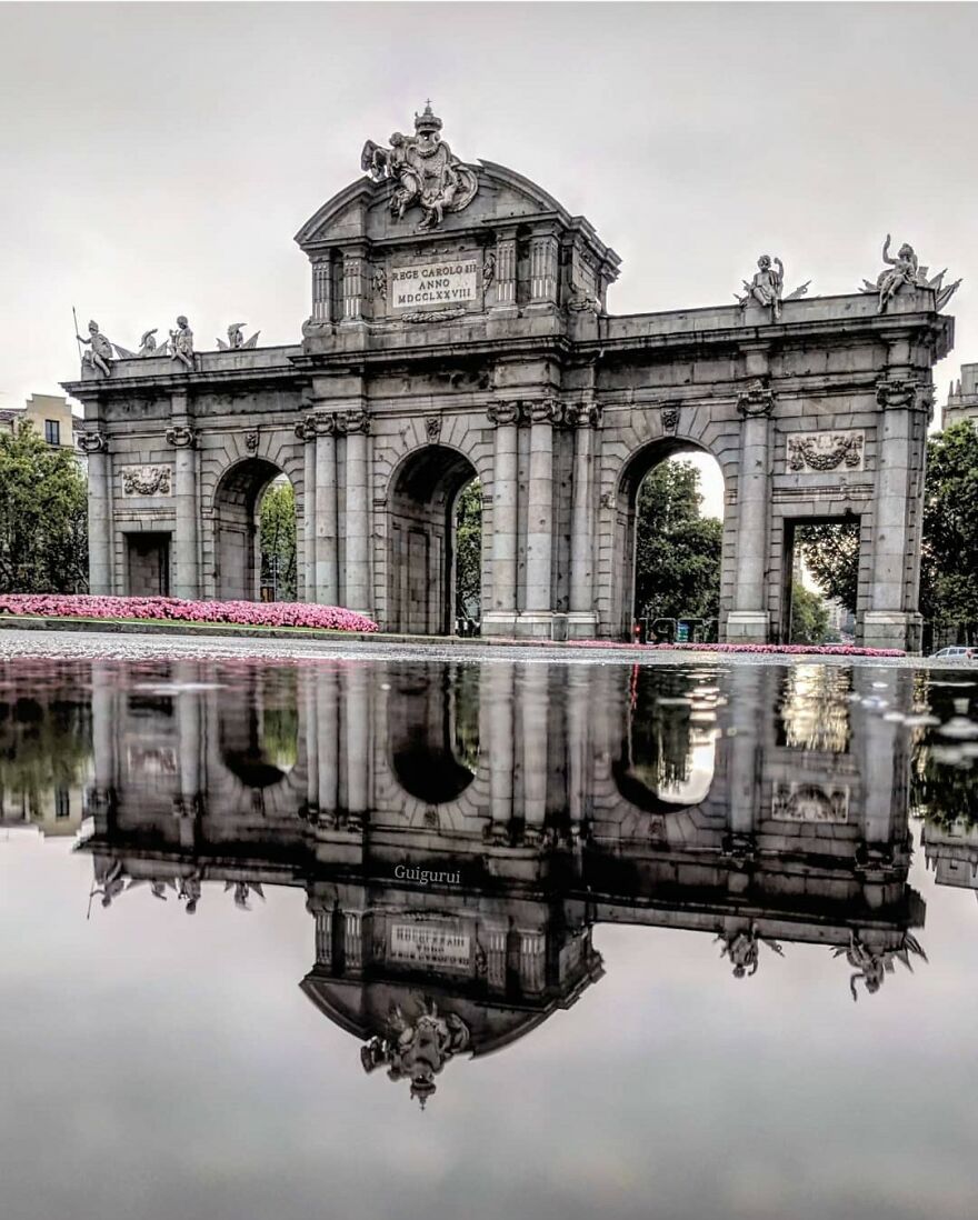 Unusual Pictures Of The Beauty Of Madrid Through Reflections And Puddles