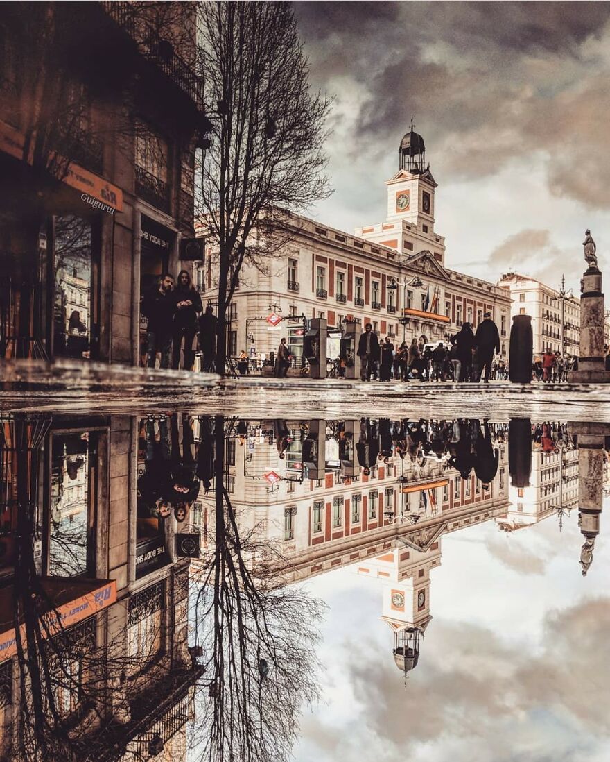 Unusual Pictures Of The Beauty Of Madrid Through Reflections And Puddles