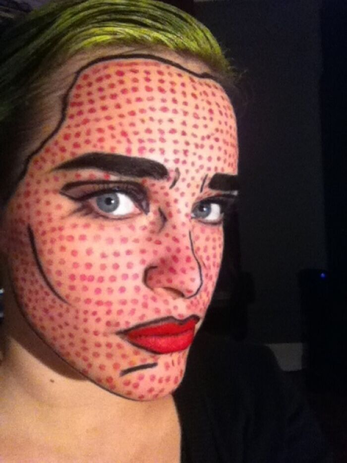 Face painted with red dots and black comic-style lines as a simple Halloween costume that turned out great.
